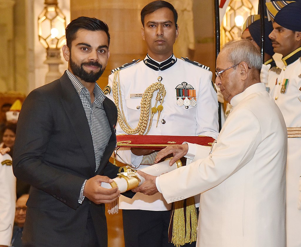 Kohli receiving the Padma Shri award from President Pranab